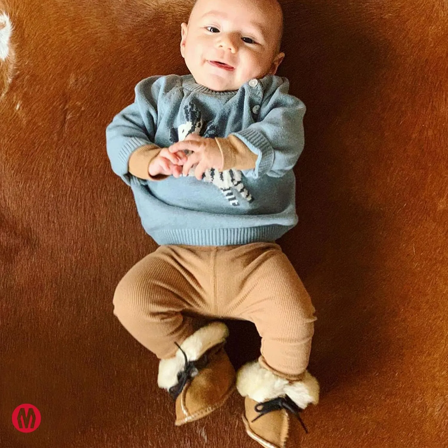 Minnetonka Genuine Sheepskin Bootie (Infant/Toddler)
