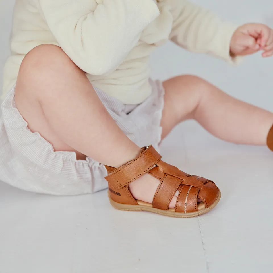 The child's first sandal with contrast stitching